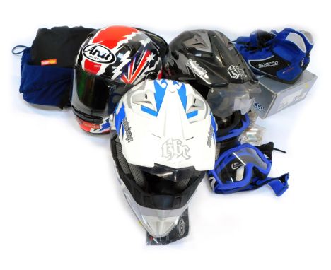 A group of motorcycle helmets and accessories, to include an Arai helmet, a pair of Sparko size 42 blue suede boots, two pair