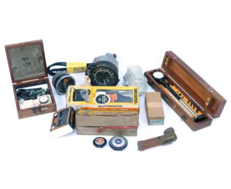 A group of car and automobile parts, to include dials, mini suspension compressor, automatic seat belts, speedo dial, a Smith