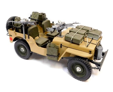 An Action Man Willys Jeep, with machine guns and jerry cans. (1) 