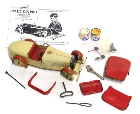 A Meccano Motor Car Constructor set number 1, with clockwork motor, key, accessories, and reprinted instruction manual, in as