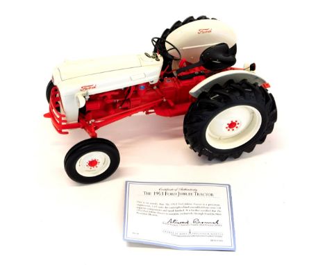 A Franklin Mint 1953 Ford Jubilee tractor, in original box with leaflet/certificate.