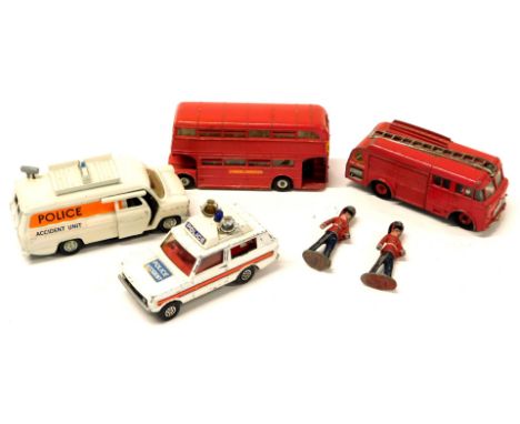 Diecast play worn vehicles, comprising Dinky Toys Police Transit Van, Police Accident Van, ESSO Grip Tyres London advertising