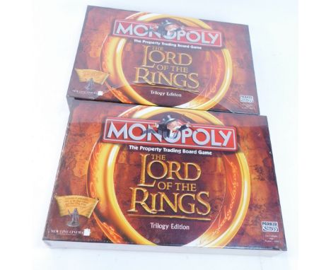 Two Monopoly Lord of the Rings Edition games. (2)