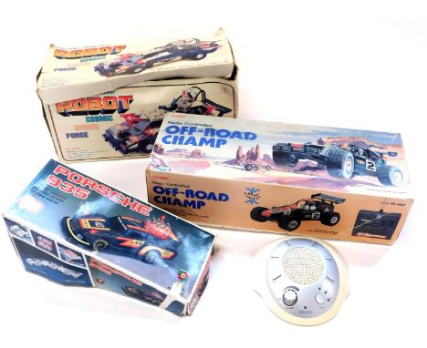 A battery operated Robot Cosmic Raider Force car, radio controlled Off Road Champ and a radio controlled Porsche 935, boxed, 