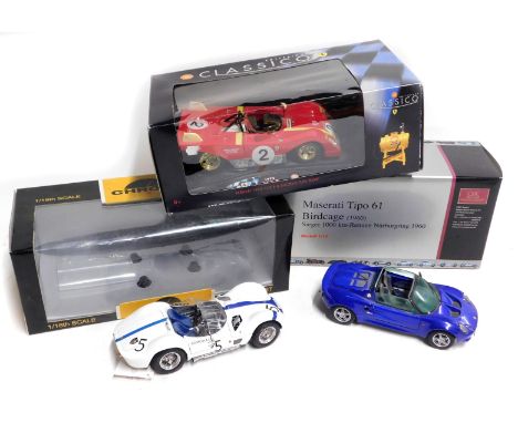 1:18 scale diecast model vehicles, including a CMC Exclusive Models Maserati Tipo 61 Birdcage 1960, a Chrono Lotus Elise, and