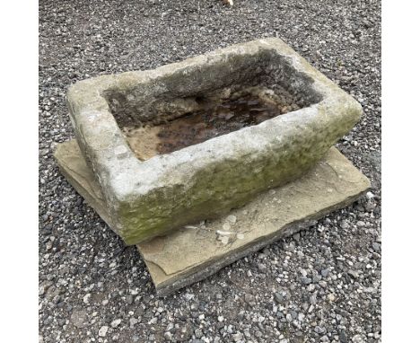 19th century small shallow carved stone trough on stone slab - THIS LOT IS TO BE COLLECTED BY APPOINTMENT FROM DUGGLEBY STORA