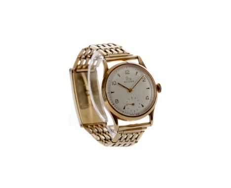 GENTLEMAN'S RECORD NINE CARAT GOLD MANUAL WIND WRIST WATCH, the round white dial with applied Arabic and wedge hour markers, 