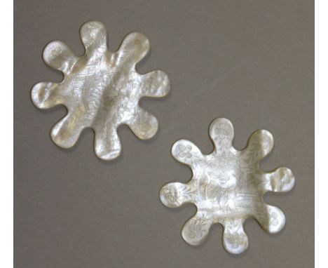 A PAIR OF MOTHER-OF-PEARL BOBBINS.