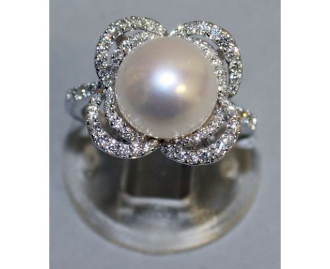 A SUPERB 18CT WHITE GOLD PEARL AND DIAMOND RING.