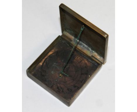 A SQUARE COPPER FOLDING COMPASS.  2ins.