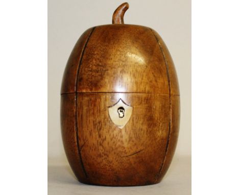 A MELON CARVED WOOD TEA CADDY. 6ins high.