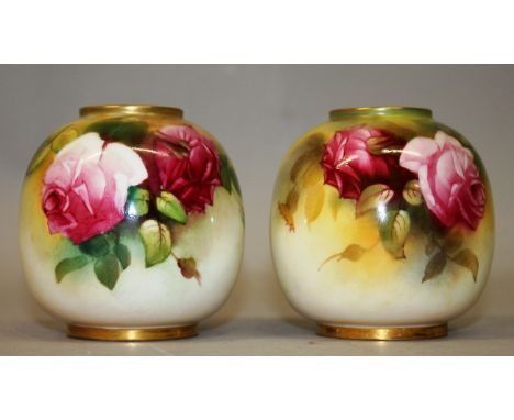 A PAIR OF ROYAL WORCESTER VASES, painted with roses by Mille Hunt, one signed, date code for 1930.