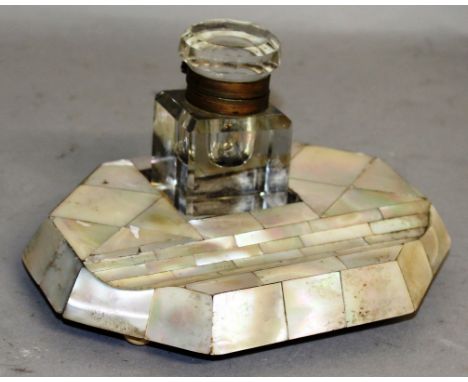 A VICTORIAN MOTHER-OF-PEARL INKSTAND with square glass bottle. 5.5ins wide.