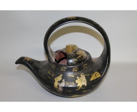 A CHINESE TERRACOTTA TEAPOT.