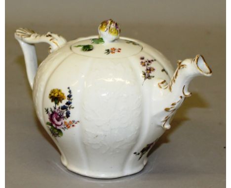 A MID 18TH CENTURY MEISSEN BULLET-SHAPED  TEAPOT AND COVER, circa 1740, with moulded dragon spout and wishbone handle, the mo
