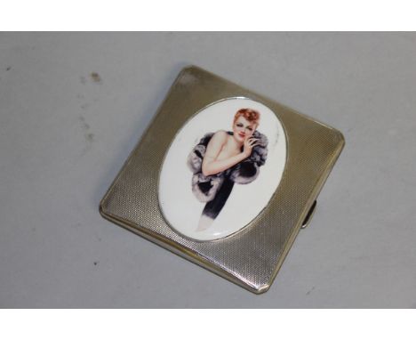 A GEORGE V ENGINE TURNED CIGARETTE CASE, Birmingham 1935, with an oval of a lady.