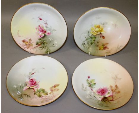 A ROYAL WORCESTER SET OF FOUR PLATES, finely painted with roses in Hadley style, date code for 1913.