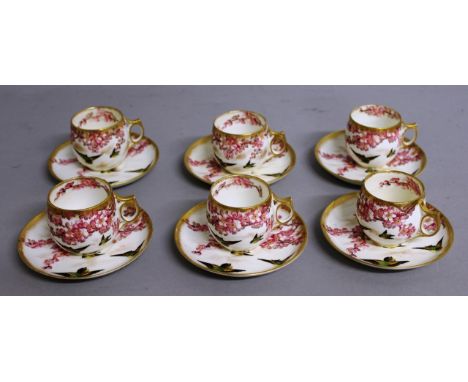 A  SET OF SIX GEORGE JONES COFFEE CUPS AND SAUCERS, birds and bloom pattern.