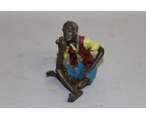 A "VIENNA" COLD CAST GROUP, BRONZE NEGRO SMOKING A PIPE. 2ins high.