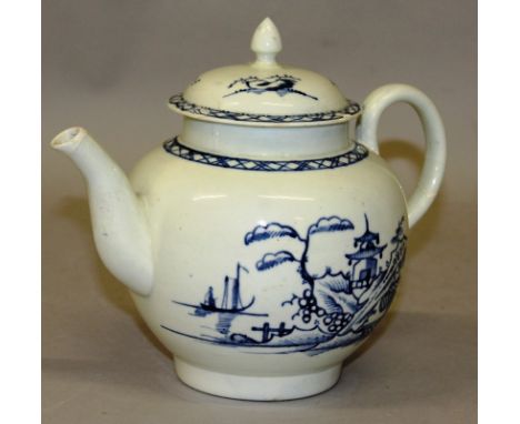 AN 18TH CENTURY LIVERPOOL TEAPOT AND COVER painted in under-glaze blue with a chinoiserie landscape.