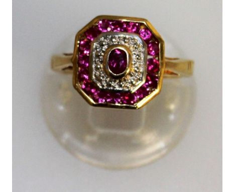 AN ART DECO DESIGN RUBY AND DIAMOND RING set in gold.