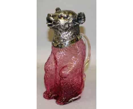 A SUPERB LARGE RUBY GLASS BEAR NOVELTY CLARET JUG with plated head and feet.  9ins high.