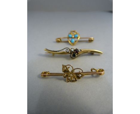 Three Gold bar brooches: 1 x 9ct (1931 Chester Hallmark) butterfly brooch set with Seed Pearls, approx: 37.66mm wide. 1 x 15c