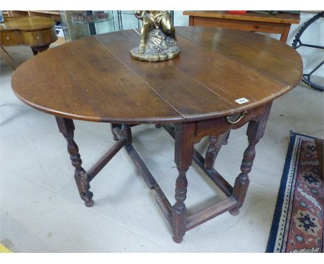 Oak gate leg table with single drawer