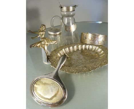 Collection of silver items to include a silver bangle, mirror, brooch and silver topped glass items.