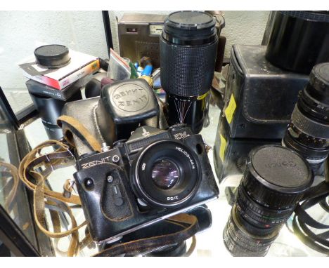 Collection of camera's - Sigma lense in case, Canon Lenses, Canon camera, Florett radio, Zenit camera, Buccaner cine camera, 