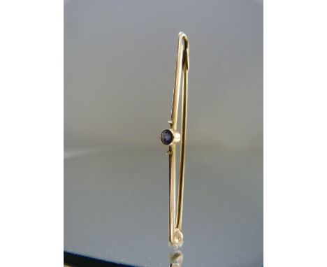 9ct 44.5mm wide knife edge bar brooch set with a small Ceylon sapphire (2 seed pearls missing) Weight approx 1.2g