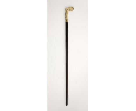 A walking stick "Nude woman", Art Nouveau, exotic wood, gilt metal ring, carved ivory handle, European, 19th/20th C., signs o