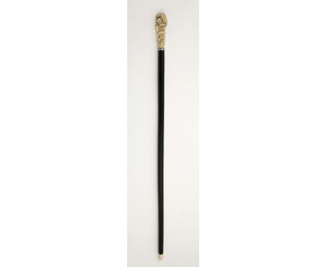 A walking stick "Snake attacking nest with eggs protected by Eagle", exotic wood swith silvered metal ring and ivory tip, car