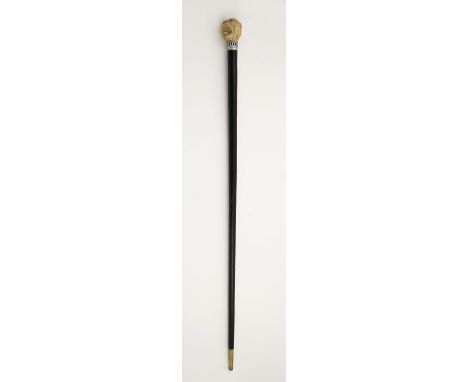 A walking stick "Bulldog Head", exotic wood, 833/1000 silver ring and brass tip, carved ivory handle, glass eyes, European, 1