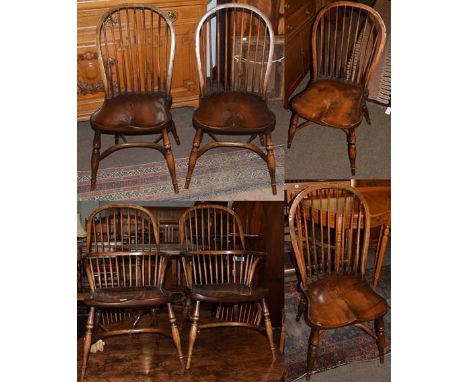 A set of six 19th century style elm seated stick back chairs including two carvers, by Walker's of Stokesley (6)