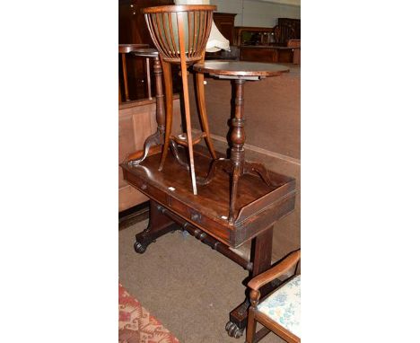 An early 19th century mahogany dressing table, three quarter gallery back, two drawers, raised on scroll supports, 105cm wide