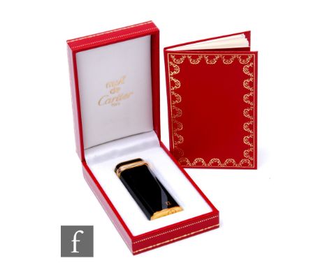A Must De Cartier black lacquer Briquet lighter, height 7cm, complete with inner and outer boxes instructions and guarantee l