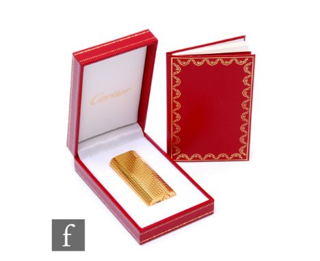 A Must De Cartier gold plated Briquet lighter, height 6cm, complete with inner and outer boxes instructions and guarantee lea