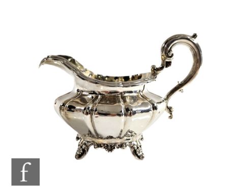 A William IV hallmarked silver melon form cream jug raised on four feet, weight 8oz, London 1839,&nbsp;Edward, Edward junior,