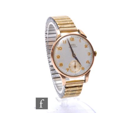 A gentleman's 9ct hallmarked Trebex manual wind wrist watch to a gilt metal bracelet. 