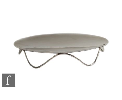 A hallmarked silver circular dish raised on a six strut wire work base, weight 10oz, diameter 19cm, Birmingham 2016, Brian Po