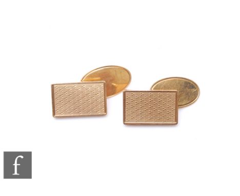 A pair of 9ct hallmarked chain linked cufflinks with an engine turned block to front, weight 11g. 