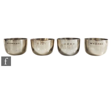 A composed set of four hallmarked silver small bowls of plain form, total weight 10.5oz, heights 4cm, widths 6.5cm, Birmingha