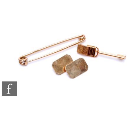 A collection of 9ct gold items, to include a tie pin, a yellow metal microphone tie or stick pin, and a single 9ct gold chain