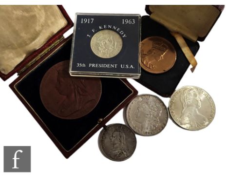 Various Victoria to Elizabeth coinage to include half crown 1890, an 1837-97 cased medal, a Morgan dollar 1880 and a 1963 hal