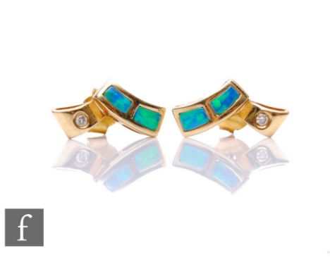 A pair of 14ct opal and diamond stud earrings each with two opal panels and a single diamond, weight 2g, later butterflies. 