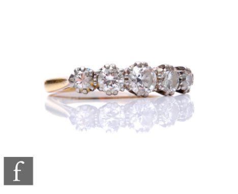 An 18ct diamond five stone ring, graduated brilliant cut stones, total weight approximately 1.00ct, weight 3.6g, ring size K 