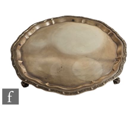 A hallmarked silver salver of plain form with Celtic style decoration, weight 44oz, diameter 36cm, Edinburgh 1969,&nbsp;J B C