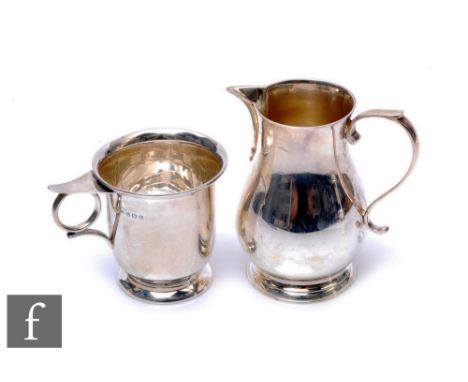 A George V silver hallmarked christening mug, 3oz, Birmingham 1930,&nbsp;I. S. Greenberg &amp; Co, together with an Elizabeth