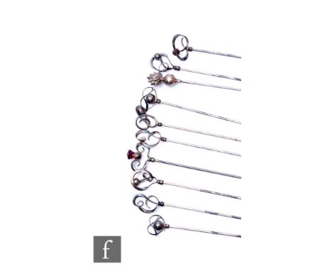 A collection of early 20th Century Charles Horner silver hallmarked hatpins, of varying stylised floral designs, lengths rang